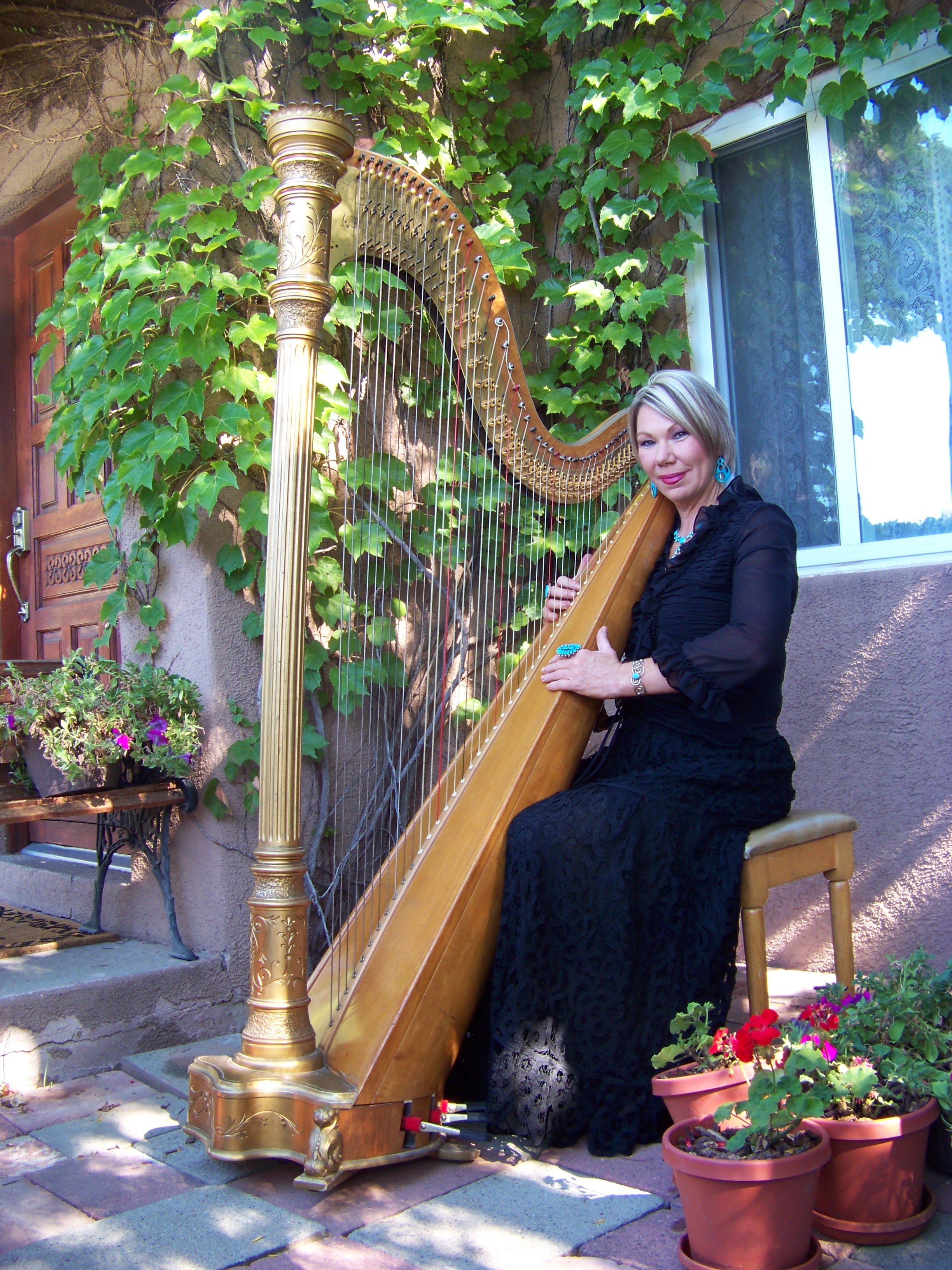 Harpist Julianne Rivera playing the harp